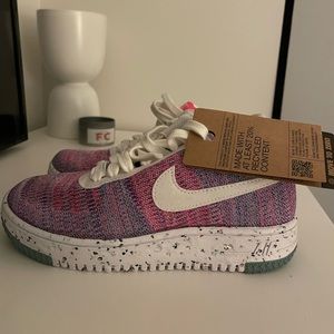Pink/multicolored women’s Nike sneaker size 5.5